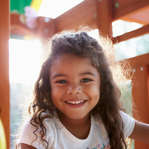 Little girl smiling after dentistry for children