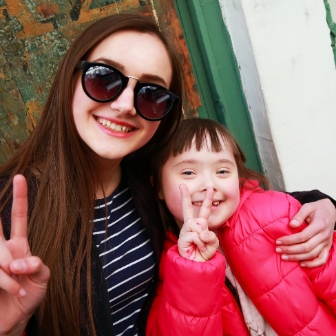 Child and mother smiling after special needs dentistry