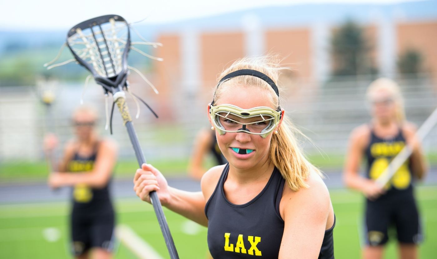 Teen athlete with custom athletic mouthguard