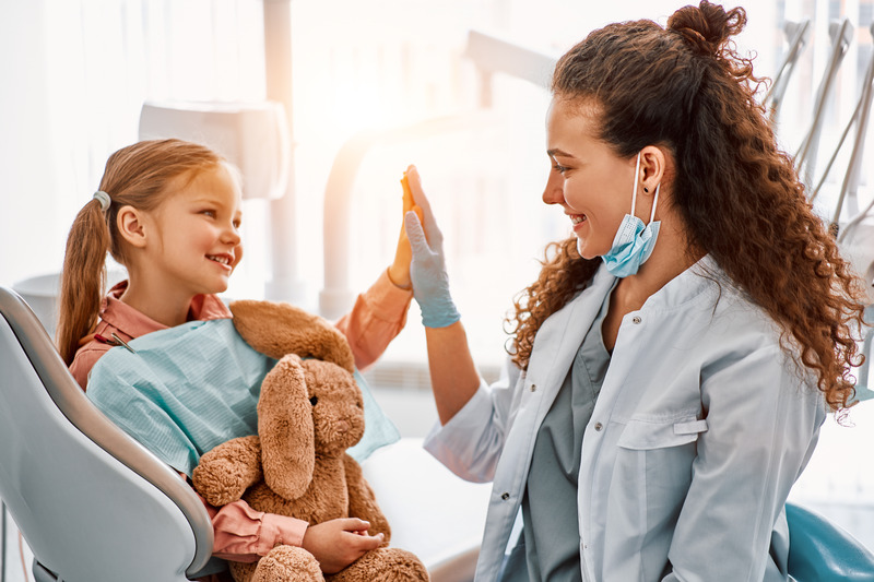 Young patient smiling during children’s dentistry